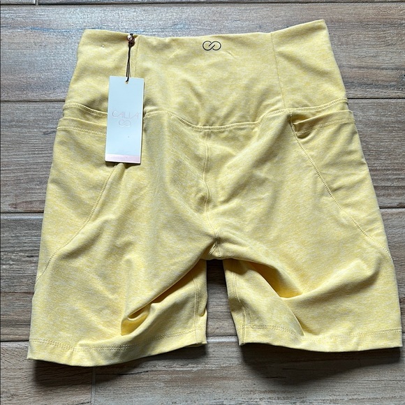 CALIA by Carrie Underwood Pants - CALIA by Carrie Underwood Cozy Essential Bike Short Golden Wheat/White Women’s M